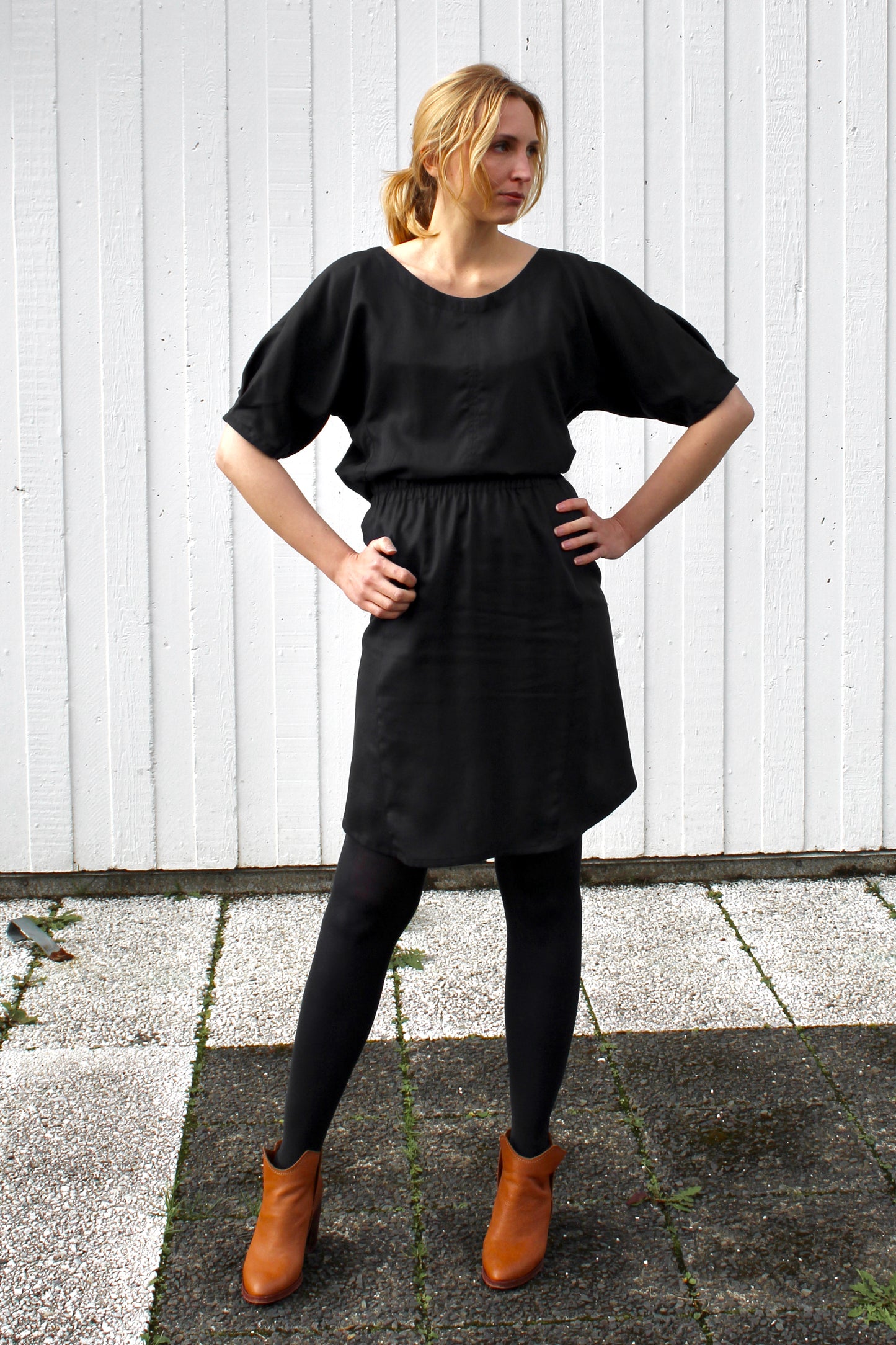 Sólan toppur í svörtu